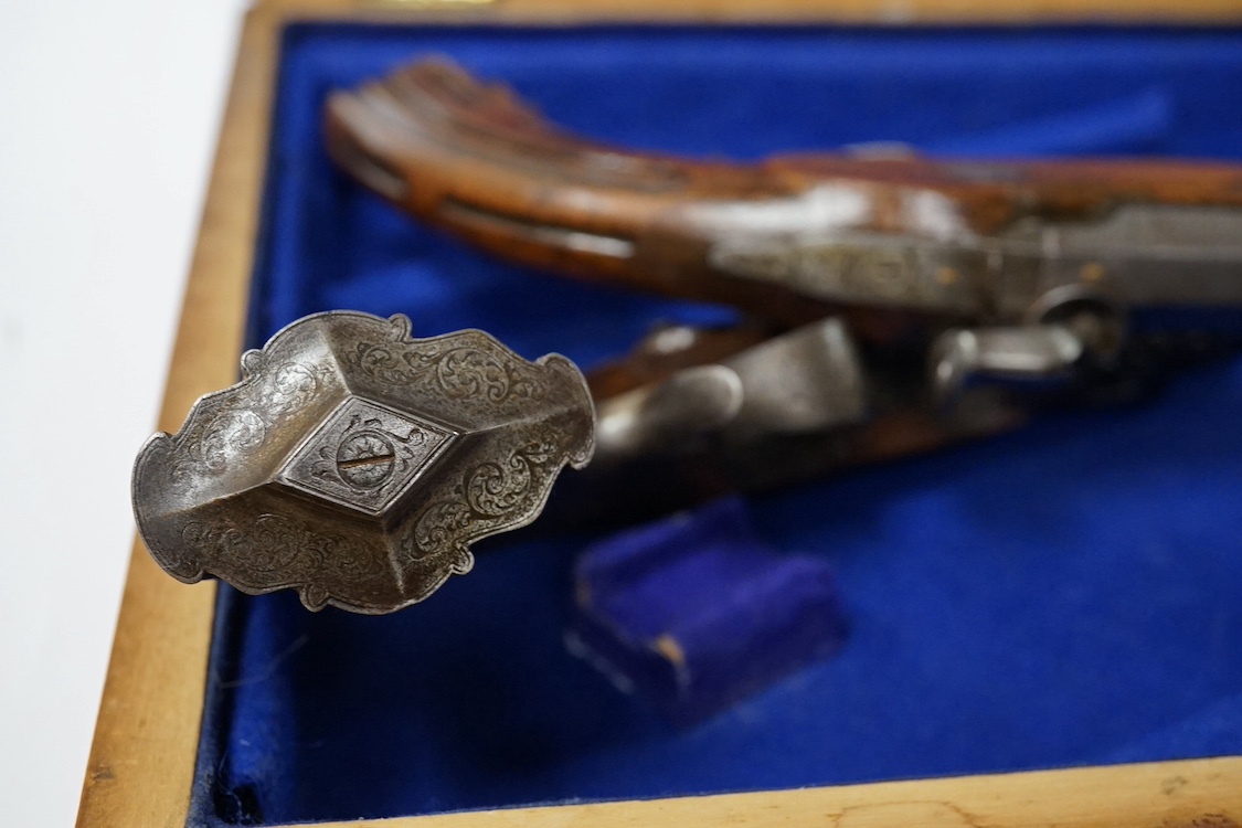 A pair of 40 bore percussion target pistols by Devisme of Paris, octagonal barrels cut with multi-groove rifling, engraved and signed locks, steel furniture ensuite, fluted walnut butts, half stocked, with gold inlaid nu